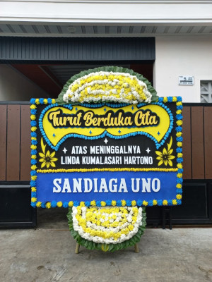 Papan Bunga Duka di Mudung Laut